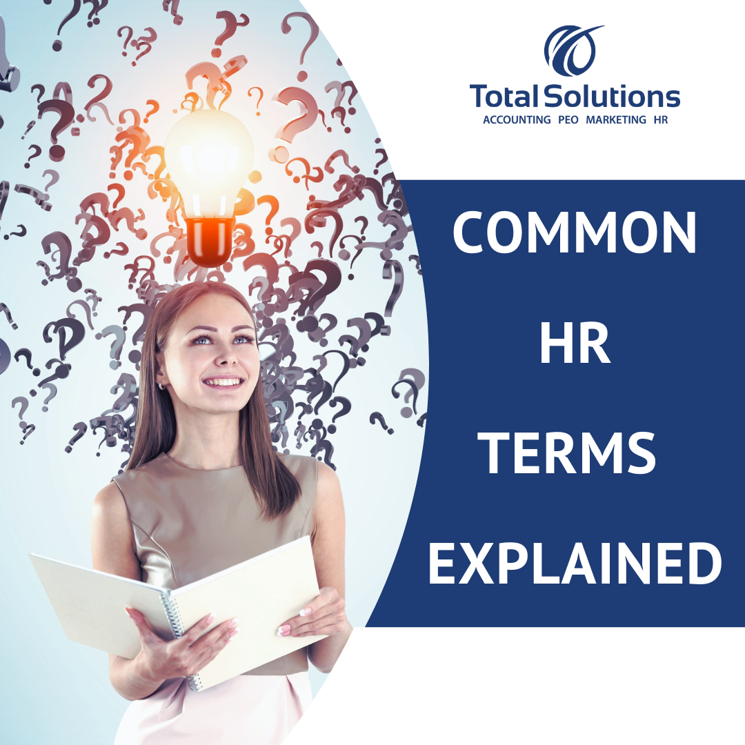 Businesswoman holding an open book with question marks behind her and a lit lightbulb over her head. Text reads 'Common HR Terms Explained'.