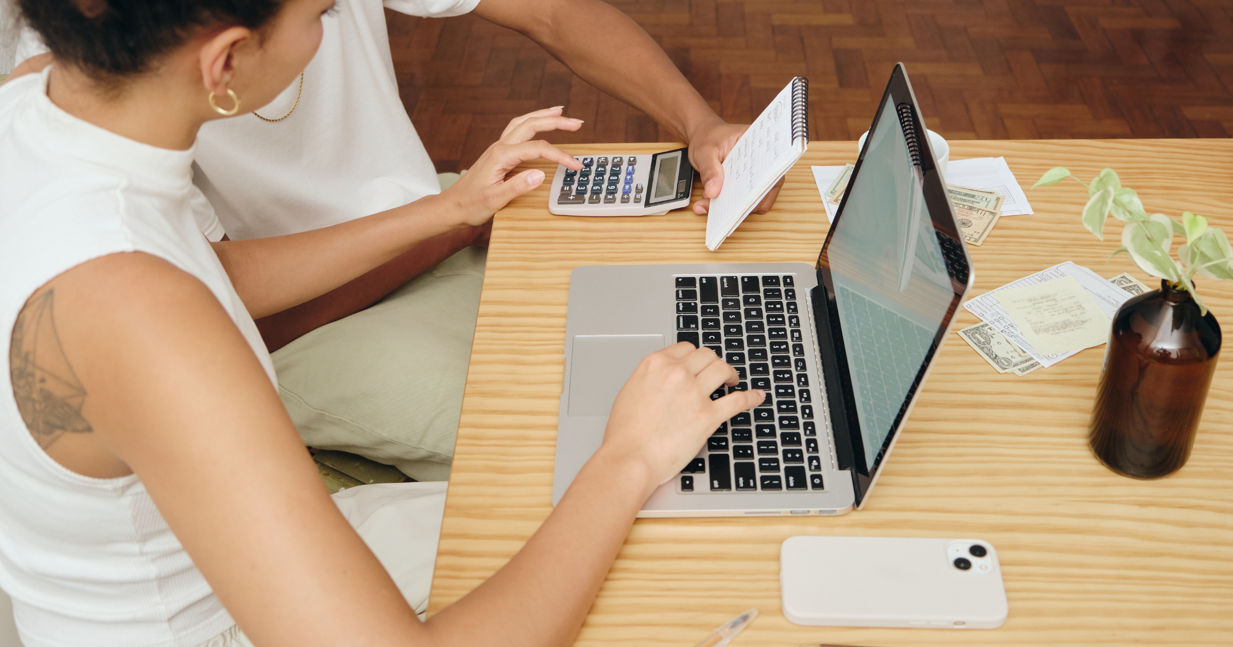 a small business owner tackling accounting essentials on a laptop